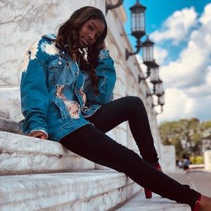 Distressed denim jacket